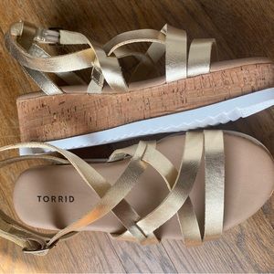Platform sandals with gold metallic straps. Never worn. Torrid size 9W
